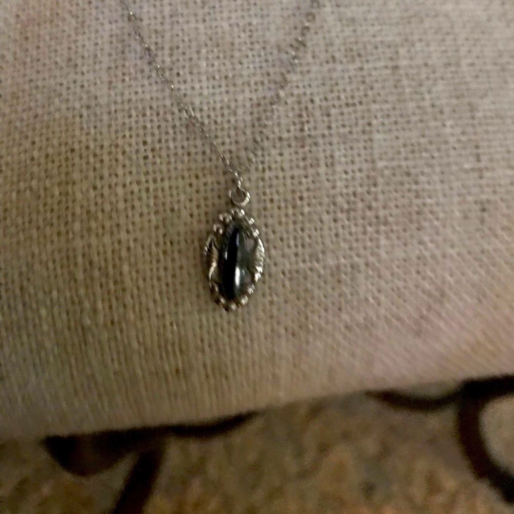 Sterling silver with what I believe to be  hemalyke